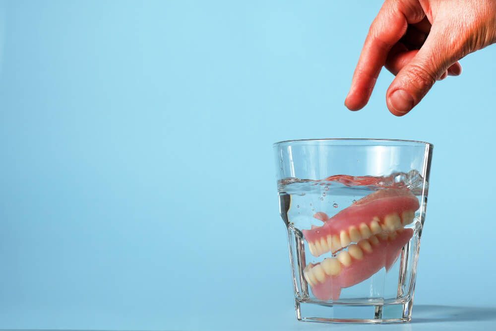 How to Remove Plaque from Dentures